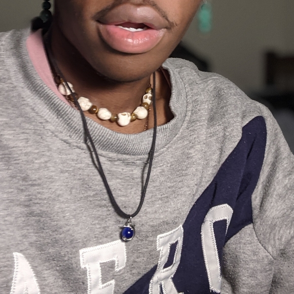 Blue stone wrapped with a dolphin necklace - Picture 2 of 5